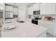 Well-appointed kitchen with quartz countertops and stainless steel appliances at 2328 Stratten Dr, Zephyrhills, FL 33541