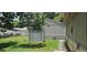 Spacious backyard with a storage shed, offering ample space for outdoor activities at 2503 Elm St, Seffner, FL 33584