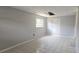 Finished bonus room with paneled wall and tile flooring at 2503 Elm St, Seffner, FL 33584