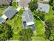 Aerial view of home featuring backyard pool, lush greenery, and privacy fencing at 3633 Springville Dr, Valrico, FL 33596