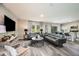 Open-concept floor plan features a living room with a view of the eat-in kitchen at 37106 Sagemoor Dr, Zephyrhills, FL 33541