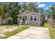 Well-maintained home with a driveway and cozy front porch at 3953 10Th S Ave, St Petersburg, FL 33711