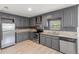 Updated kitchen features stainless steel appliances and ample cabinet space at 3953 10Th S Ave, St Petersburg, FL 33711