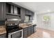 Updated kitchen with stainless steel appliances and granite countertops at 3953 10Th S Ave, St Petersburg, FL 33711