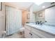 This bathroom has a shower and tub combination, toilet, and granite vanity at 4450 Gulf Blvd # 110, St Pete Beach, FL 33706