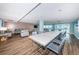 Spacious lounge and dining area with ample seating and ocean views, ideal for entertaining and relaxation at 4450 Gulf Blvd # 110, St Pete Beach, FL 33706