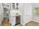 Beverage center includes wine storage, cabinets and marble countertop at 4522 S Hale Ave, Tampa, FL 33611