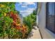 Lush landscaping featuring vibrant foliage and a serene walkway, creating a tranquil and inviting outdoor space at 4522 S Hale Ave, Tampa, FL 33611