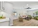 Cozy living room shows wood floors and a view of the backyard at 4522 S Hale Ave, Tampa, FL 33611