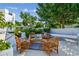 Charming patio with comfortable seating and a lush garden backdrop, ideal for outdoor relaxation and entertaining at 4522 S Hale Ave, Tampa, FL 33611