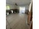 Bedroom interior with tile flooring, awaiting transformation, and direct access to the outdoors at 6000 Denver Ne St, St Petersburg, FL 33703