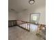 Renovation stage of a room showcasing tiled floors, and exposed studs ready for customization at 6000 Denver Ne St, St Petersburg, FL 33703