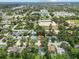 Aerial view showcasing the property and surrounding neighborhood at 6051 65Th N Ave, Pinellas Park, FL 33781