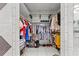 Walk-in closet with tiled floor, and lots of shelf and hanging storage space at 6051 65Th N Ave, Pinellas Park, FL 33781