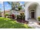 Charming single-story home with landscaped front yard and inviting entrance at 6051 65Th N Ave, Pinellas Park, FL 33781