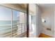 Balcony featuring water views, access to the interior, and outdoor seating at 6105 Bahia Del Mar Cir # 682, St Petersburg, FL 33715