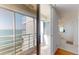 This balcony features an amazing water view and also leads to the bathroom and other parts of the house at 6105 Bahia Del Mar Cir # 682, St Petersburg, FL 33715