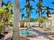 Inviting hot tub surrounded by lush landscaping and lounge chairs at 6105 Bahia Del Mar Cir # 682, St Petersburg, FL 33715