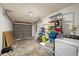 Spacious garage area providing parking and additional storage options at 6263 Oak Cluster Cir, Tampa, FL 33634