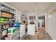 Functional laundry area with washer, dryer, and ample storage space at 6263 Oak Cluster Cir, Tampa, FL 33634