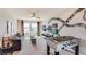 Inviting game room with a foosball table, media center, and seating area, perfect for entertainment at 6413 Gladeview Way, Land O Lakes, FL 34638