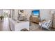 Bright living room with modern decor, stylish furniture, and large windows that bring in natural light at 6725 Flint Creek Dr, Land O Lakes, FL 34638