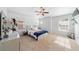 Bright bedroom with carpet, ceiling fan, and windows providing natural light at 7001 Interbay Blvd # 192, Tampa, FL 33616