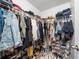 Walk-in closet with shelving and hanging space for clothes and shoes at 7001 Interbay Blvd # 192, Tampa, FL 33616