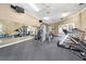Community gym with mirrors, ceiling fans, and a variety of exercise equipment at 7001 Interbay Blvd # 192, Tampa, FL 33616