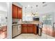 Spacious kitchen with granite countertops, stainless steel appliances, and a view into the living area at 7001 Interbay Blvd # 192, Tampa, FL 33616