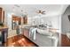 Open concept living area with hardwood floors and a comfortable couch at 7001 Interbay Blvd # 192, Tampa, FL 33616