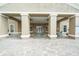 Outdoor hot tub area surrounded by pillars and community pool access at 7001 Interbay Blvd # 192, Tampa, FL 33616