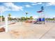 Community splash pad and playground area offering a fun and engaging space for to cool off and play at 7017 Gomez Rocks Ct, Sun City Center, FL 33573