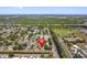 Aerial view of the neighborhood showcasing the proximity to parks, green spaces, and community amenities at 7676 18Th St N, St Petersburg, FL 33702