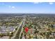 Aerial view of the home location near parks, a waterway, and other residential properties at 7676 18Th St N, St Petersburg, FL 33702