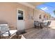 Home back patio with outdoor dining and lounge furniture, tiled floors, and a bright, open atmosphere at 7676 18Th St N, St Petersburg, FL 33702