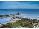 Stunning aerial view of the pier with a restaurant and marina on a sunny day at 841 4Th N Ave # 21, St Petersburg, FL 33701