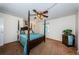 Traditional bedroom with a four-poster bed, soft lighting and a warm, inviting atmosphere at 841 4Th N Ave # 21, St Petersburg, FL 33701