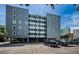 Exterior daytime shot of condo building with parking and modern design under a bright blue sky at 841 4Th N Ave # 21, St Petersburg, FL 33701