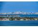 Expansive waterfront view with luxurious homes and a prominent city skyline in the distance at 841 4Th N Ave # 21, St Petersburg, FL 33701