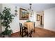 Dining area with ornate table and chairs featuring a decorative light fixture at 841 4Th N Ave # 21, St Petersburg, FL 33701