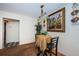 Dining area with ornate table and chairs featuring a decorative light fixture and wall decorations at 841 4Th N Ave # 21, St Petersburg, FL 33701