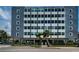 Exterior view of the Suncoast Towers building showcasing its multi-story design and landscaping at 841 4Th N Ave # 21, St Petersburg, FL 33701