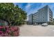 Modern building exterior with ample parking and beautiful landscaping at 841 4Th N Ave # 21, St Petersburg, FL 33701