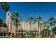 Grand hotel exterior with palm trees, a tower, and well-manicured landscaping for a luxurious experience at 841 4Th N Ave # 21, St Petersburg, FL 33701