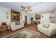Cozy living room with ceiling fan, area rug, and comfortable seating arrangement at 841 4Th N Ave # 21, St Petersburg, FL 33701