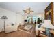 Inviting living room featuring a ceiling fan, decorative rug, and comfortable seating at 841 4Th N Ave # 21, St Petersburg, FL 33701