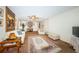 Comfortable living room featuring neutral tones, ceiling fan, and decorative rug at 841 4Th N Ave # 21, St Petersburg, FL 33701