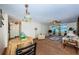 Spacious living room featuring fan, area rug, and comfortable seating arrangement at 841 4Th N Ave # 21, St Petersburg, FL 33701