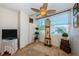 Inviting living space featuring vintage clock, large window and vintage furnishings at 841 4Th N Ave # 21, St Petersburg, FL 33701
